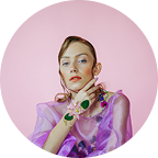 beautiful-girl-bra-fresh-flowers-transparent-violet-blouse-with-elegant-hairdo